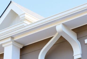 Detailed image of a house roof, highlighting the texture of shingles, featuring Titan Exteriors branding Detailed image of a house roof, highlighting the texture of shingles, featuring Titan Exteriors branding